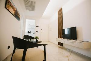 TV a/nebo společenská místnost v ubytování Dalia Suite & Relax