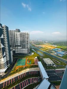 an aerial view of a city with tall buildings at Homestay Bangi Murah in Kajang
