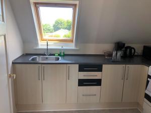 Una cocina o cocineta en Bispensgade i Hjørring