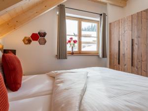 Postel nebo postele na pokoji v ubytování Alpenjoy Lodge