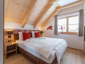 Postel nebo postele na pokoji v ubytování Alpenjoy Lodge