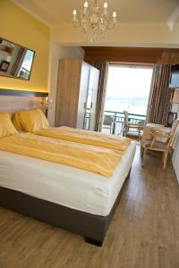 Postel nebo postele na pokoji v ubytování Villa Desiree - Hotel Garni - Adults Only