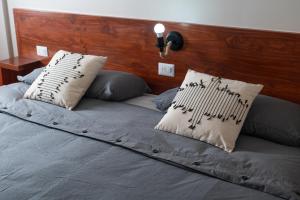 Postel nebo postele na pokoji v ubytování Hotel Solumbra