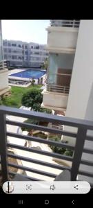 a view from a window of a building with a swimming pool at Mansbay in O Ben Slimane