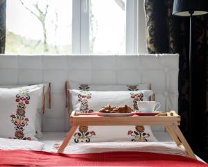 Łóżko lub łóżka w pokoju w obiekcie Apartament Tosia Zakopane
