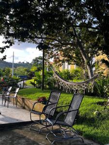 Zahrada ubytování Villas Cocos Chalé Triplo + 13 fotografií
