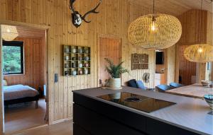 Voodi või voodid majutusasutuse 3 Bedroom Cozy Home In Blokhus toas