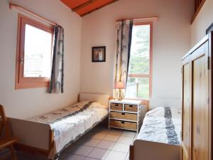 Postel nebo postele na pokoji v ubytování Holiday Home in Marignac with Mountain Views, cleaning included