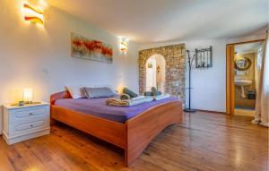 Łóżko lub łóżka w pokoju w obiekcie Holiday Home Medulin 33