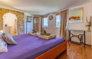 Łóżko lub łóżka w pokoju w obiekcie Holiday Home Medulin 33