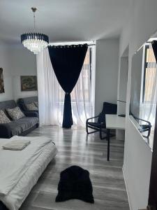 Φωτογραφία από το άλμπουμ του Ultra Central Piata Libertatii Apartment στην Τιμισοάρα