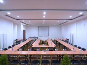 a large conference room with long tables and chairs at Semabu Hills Hotel Nusa Penida in Nusa Penida +37 photos