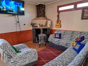 Χώρος καθιστικού στο Hostal El Amigo Lucho
