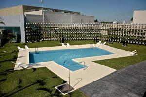 La pileta dentro o cerca de Gala Hotel y Convenciones