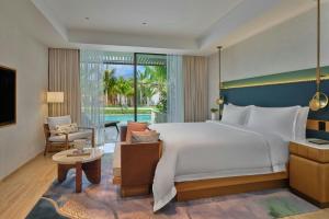Postel nebo postele na pokoji v ubytování The St. Regis Cap Cana Resort