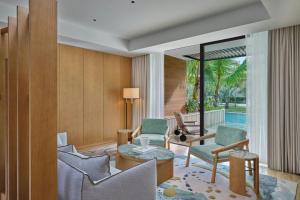Posezení v ubytování The St. Regis Cap Cana Resort