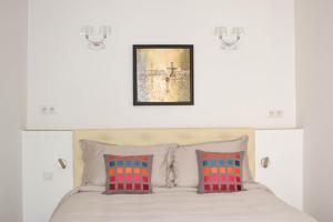 Postel nebo postele na pokoji v ubytování Assia & Nathalie - Luxury B&B MARAIS