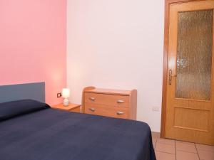 Posteľ alebo postele v izbe v ubytovaní Apartment in Vieste, a drive away from the sea