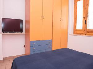 Posteľ alebo postele v izbe v ubytovaní Apartment in Vieste, a drive away from the sea