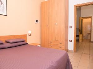 Posteľ alebo postele v izbe v ubytovaní Apartment in Vieste, a drive away from the sea