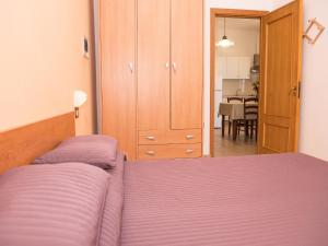 Posteľ alebo postele v izbe v ubytovaní Apartment in Vieste, a drive away from the sea