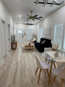 a living room with a couch and a table at Dockside Dreams in Tarpon Springs