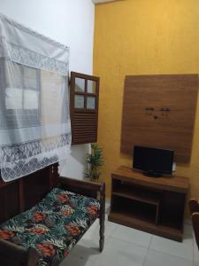 TV a/nebo společenská místnost v ubytování Casa Aconchego em Lençóis