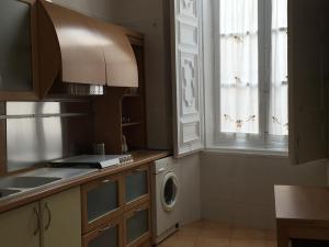A kitchen or kitchenette at Palazzo Doxi Fontana Dimora Storica