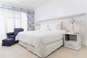 Cama ou camas em um quarto em La Mision Hotel Boutique
