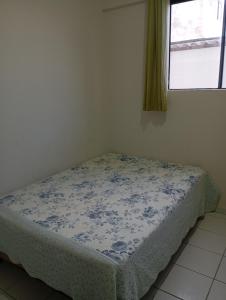 Ένα ή περισσότερα κρεβάτια σε δωμάτιο στο Apartamento próximo ao parque do povo