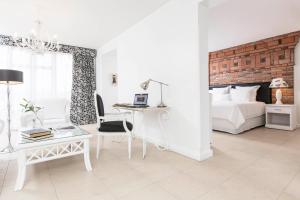 Cama ou camas em um quarto em La Mision Hotel Boutique