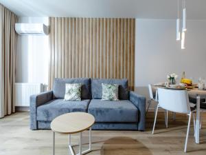 Posezení v ubytování Apartment in Dziwnów by River and Beach, cleaning included
