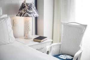 Cama ou camas em um quarto em La Mision Hotel Boutique