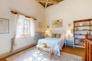 Ένα ή περισσότερα κρεβάτια σε δωμάτιο στο Maison Des Pelerins +50 φωτογραφίες