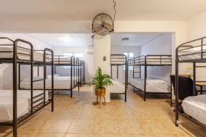 เตียงในห้องที่ Hacienda M&B Perfect for Groups, with Pool and Spacious Patio