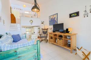 Μια τηλεόραση ή/και κέντρο ψυχαγωγίας στο Angie by the sea