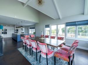 a dining room with a table and chairs at New England Mansion in Soberton