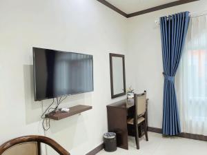 TV a/nebo společenská místnost v ubytování La Serena Hotel & Apartment