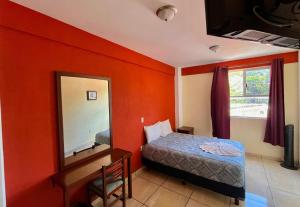 Postel nebo postele na pokoji v ubytování Hotel Casa Rus