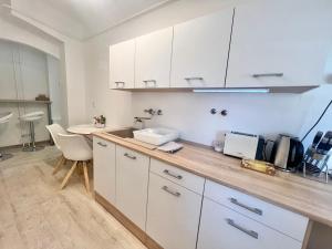 Η κουζίνα ή μικρή κουζίνα στο Roosevelt Center Apartman