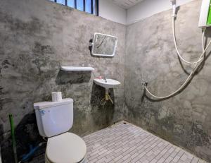 a bathroom with a shower and a toilet and a sink at Dreamy beachfront bungalow in Baan Tai +26 photos