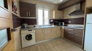 Kuchyň nebo kuchyňský kout v ubytování Apartamentos Alcazar de Baeza