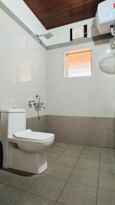 Koupelna v ubytování Estate Stay