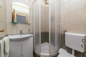 Kúpeľňa v ubytovaní Apartments Divna + 37 fotografií