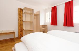 Postel nebo postele na pokoji v ubytování Alpinhotel Bort