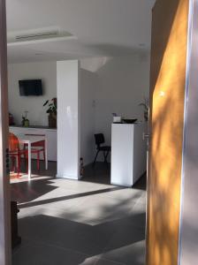 Televízia a/alebo spoločenská miestnosť v ubytovaní La Veranda Sul Giardino