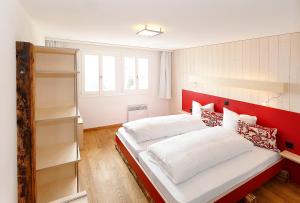 Postel nebo postele na pokoji v ubytování Alpinhotel Bort