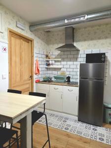 Kuchyň nebo kuchyňský kout v ubytování Hostel Bretema