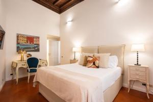 Posteľ alebo postele v izbe v ubytovaní Avila Palace Piazza Navona