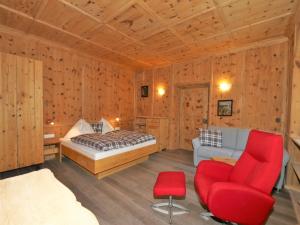 A bed or beds in a room at Apartment building, Fügen
